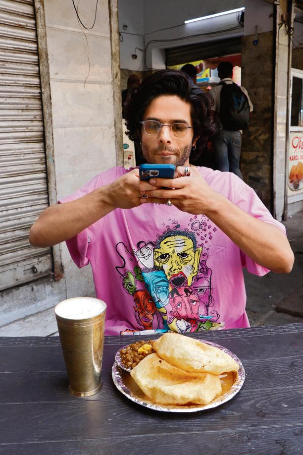 The actor gorges on a plate of chhole bhature and a tall glass of lassi and shares, "My first two days back in Delhi, I only ate chhole bhature!"(Photo: Dhruv Sethi/HT) The actor gorges on a plate of chhole bhature and a tall glass of lassi and shares, "My first two days back in Delhi, I only ate chhole bhature!"(Photo: Dhruv Sethi/HT)