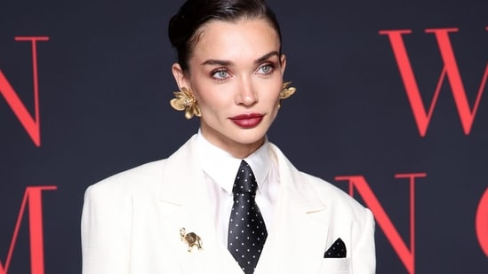 Amy Jackson stunned in white at Cannes Film Festival. Amy Jackson stunned in white at Cannes Film Festival.