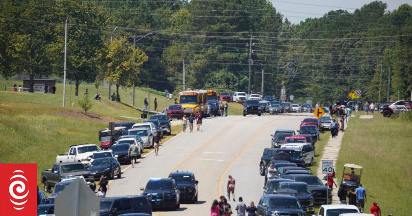 Georgia arrests father of teen suspected of killing four at school