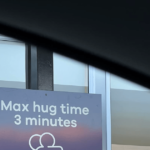 Dunedin Airport’s three-minute hug limit makes global headlines