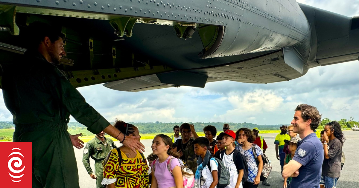 4KEUSYX A group of School children boarding military CASA aircraft repatriated to New Caledonia PHOTO French Embassy in Vanuatu jpg