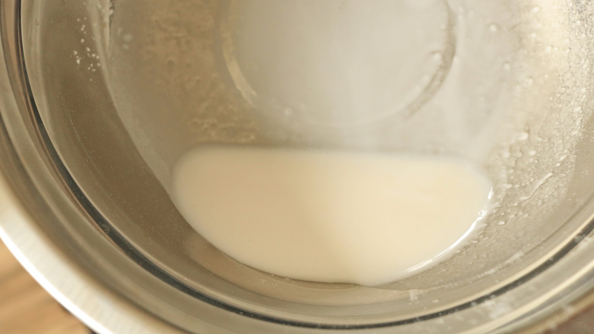 Tapioca flour in water in a silver bowl.