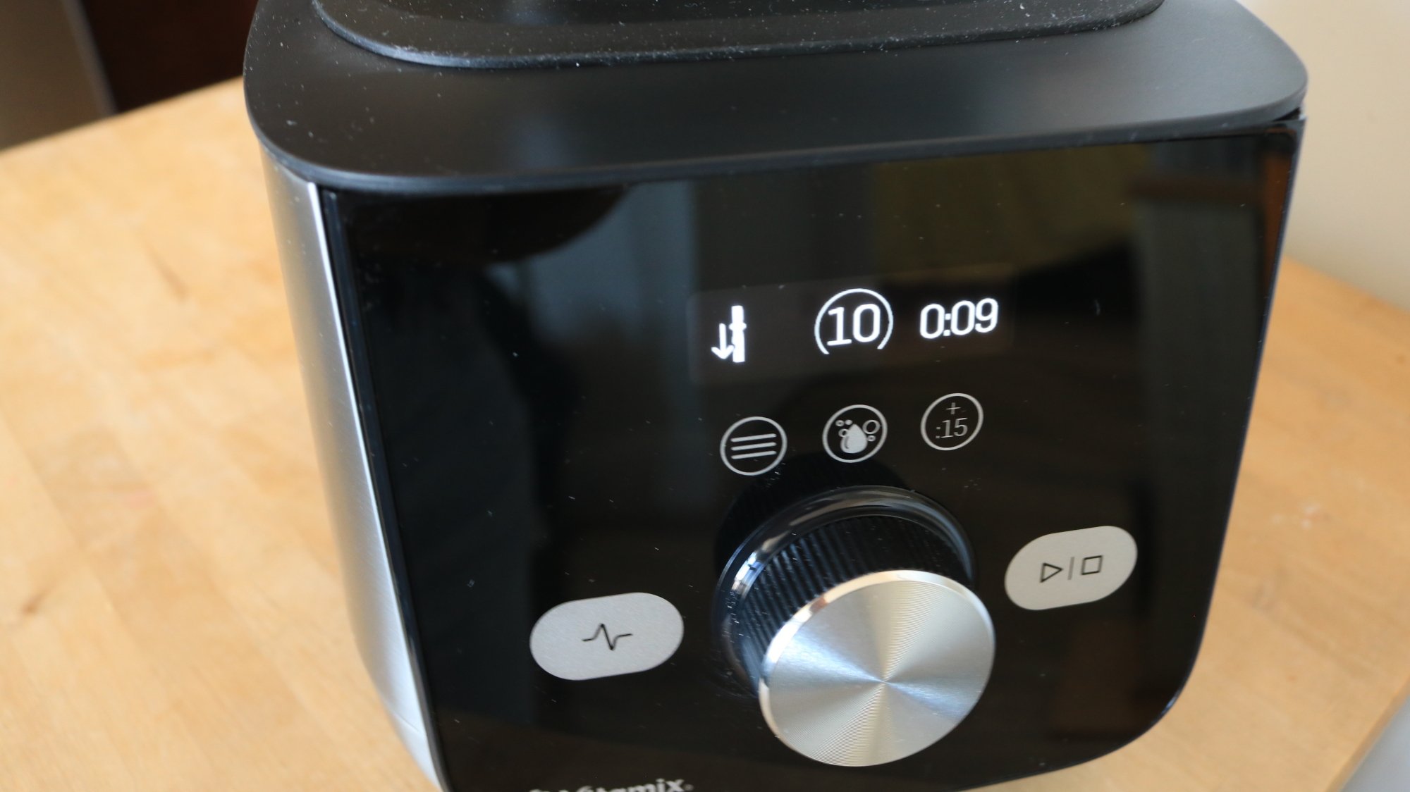 How to Make Peanut Butter in the Vitamix Ascent X5 5 The tamper icon on the blender control display.