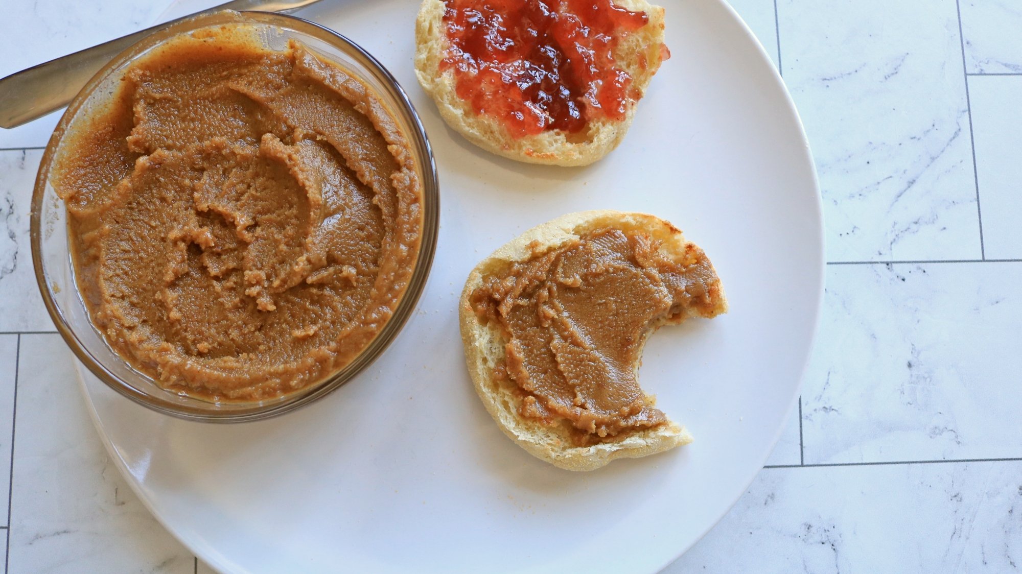 How to Make Peanut Butter in the Vitamix Ascent X5 7 Walnut butter on an English muffin.