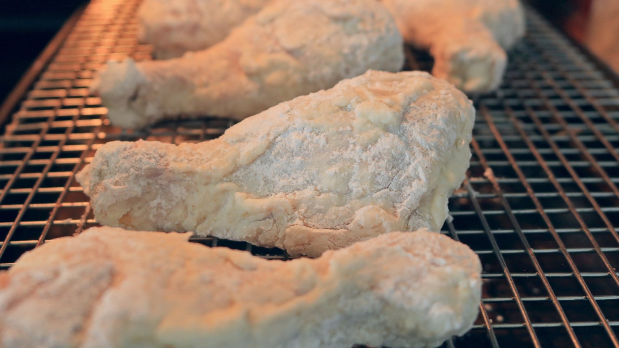 How to Use Self-Rising Flour for an Egg-Free Fried Chicken Crust 3 Chicken drumsticks coated in self-rising flour breading.