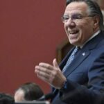 Quebec government adopts secularism bill forcing students to uncover faces