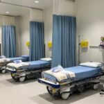 Alberta’s plan to let doctors work publicly and privately worries critics, health-care advocates