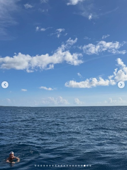 A screengrab of Katy Perry' Instagram post shows Justin Trudeau swimming in the ocean.