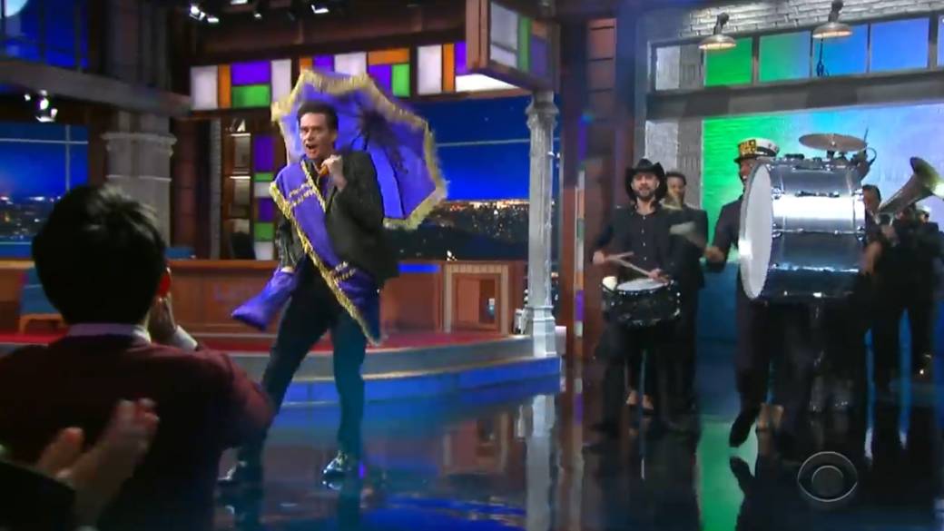 Click to play video: 'Jim Carrey quite literally parades his way onto Stephen Colbert’s ‘The Late Show’'