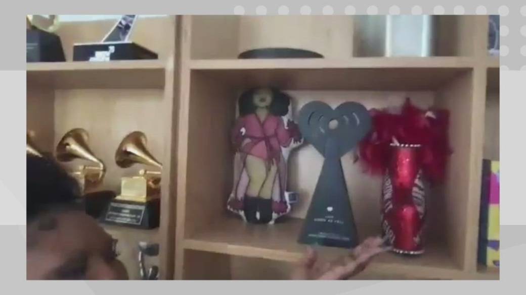 Click to play video: 'Lizzo shows us all of her awards – displayed beside her baby Yoda collection'